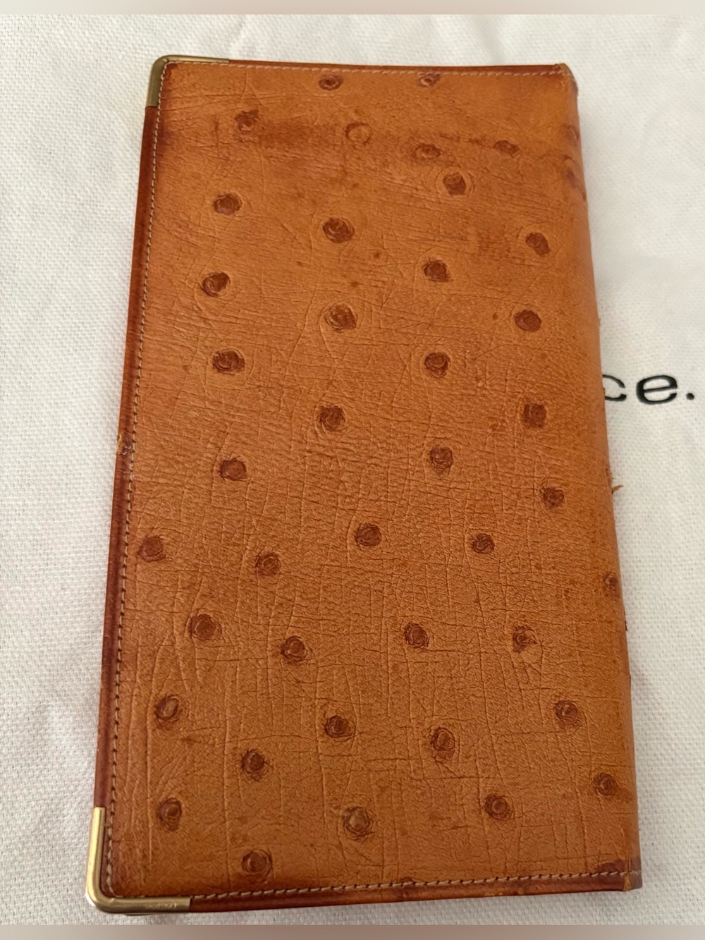 Leonard R Condon  ostrich wallet long with card and stamp area